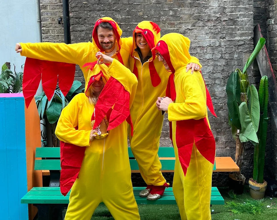 Players posing with a Chicken during the hunt