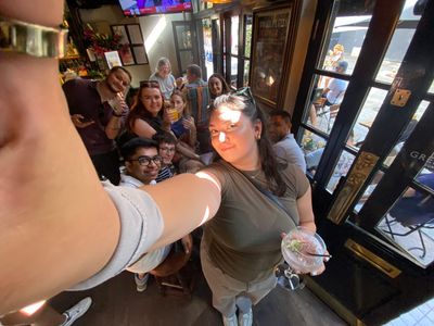 colleagues celebrating with drinks after finishing the hunt