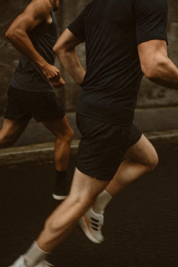 Two men running during RUN game